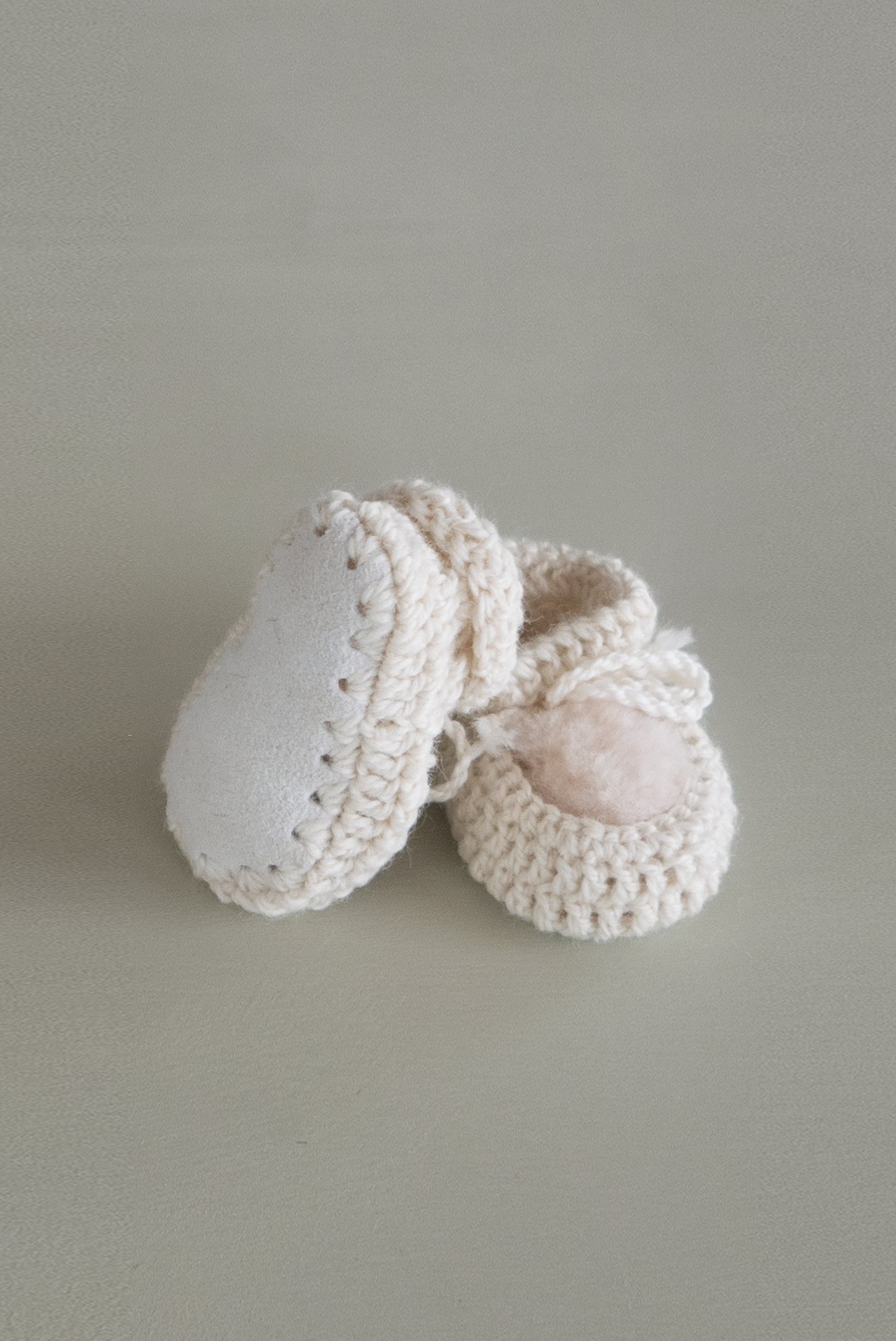 Cream coloured sheepskin baby bootie