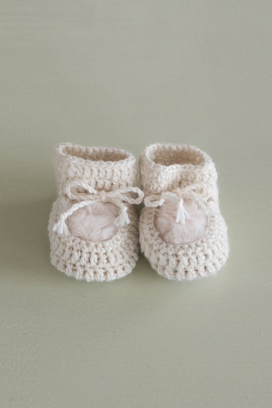 Crean coloured newborn sheepskin baby bootie